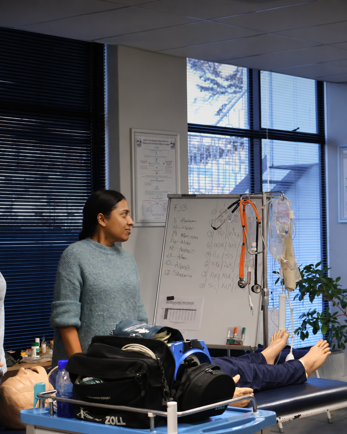 Illustrative healthcare simulation learning scene with learners and a clinical educator